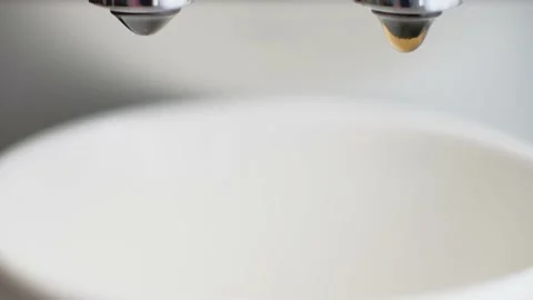 Making coffee with coffeemachine upclose Stock Footage 134870153