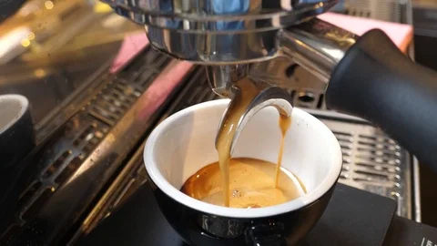 Making coffee cup on espresso machine in a cafe bistro Stock Footage