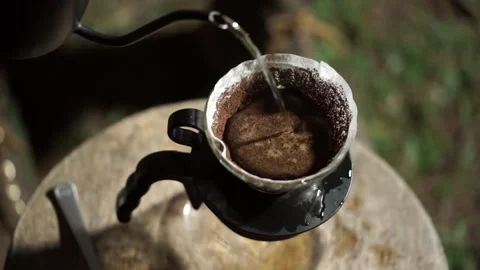 Making coffee drip in the forest Stock Footage 259794045