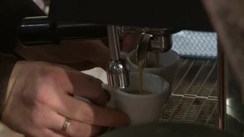 Making coffee in electric coffe machine in a cafe Stock Footage