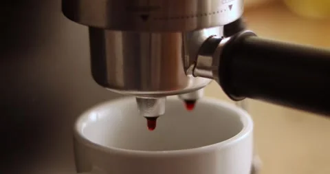 Making coffee espresso or ristretto in coffee machine. Home making hot Espres Stock Footage 300364599