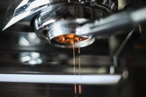 Making of coffee extraction from a espresso machine Stock Photos