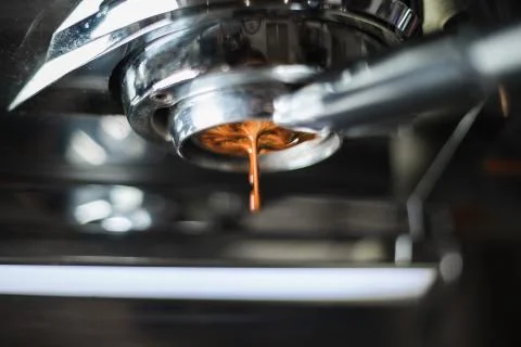 Making of coffee extraction from a espresso machine Stock Photos