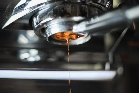 Making of coffee extraction from a espresso machine Stock Photos