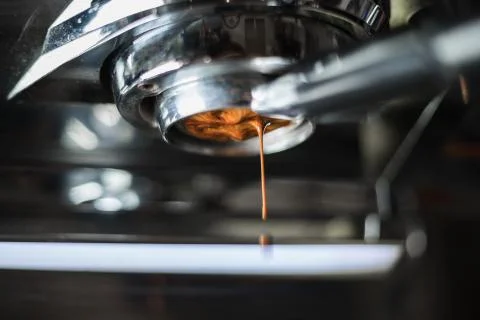 Making of coffee extraction from a espresso machine Stock Photos