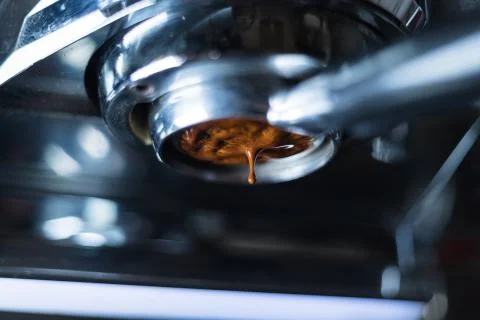 Making of coffee extraction from a espresso machine Stock Photos