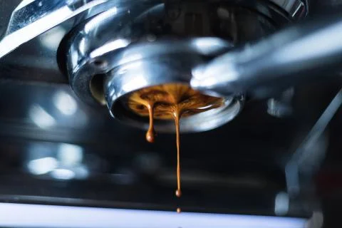 Making of coffee extraction from a espresso machine Stock Photos