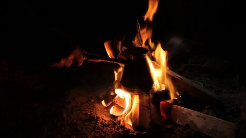 Making coffee on the fire Stock Footage 71542964