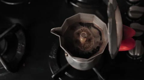 Making coffee on a gas cooker Stock Footage 55197911