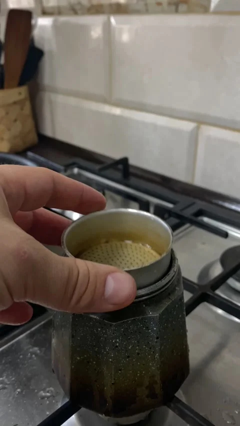 Making coffee in geyser kettle close up Stock Footage 244799699