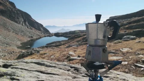 Making a coffee in the mountain with moka Stock Footage 169225084