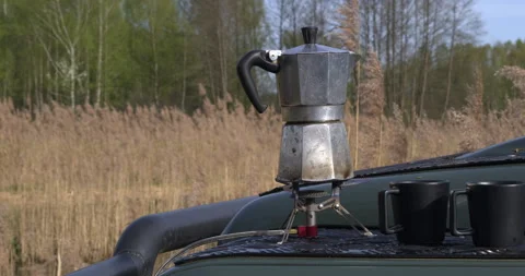 Making coffee outdoors. Stock Footage 277034713