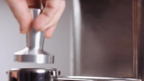 Making coffee process. Barista preparing espresso and pouring it in cup. Stock Footage 112681162