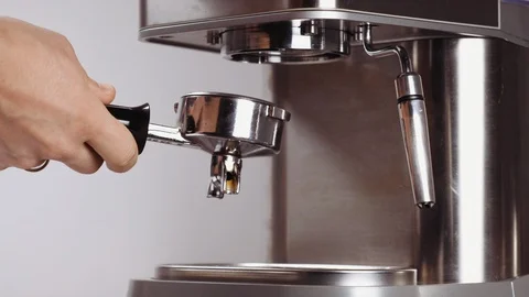 Making coffee process. Barista preparing espresso and pouring it in cup. Stock Footage 112681192