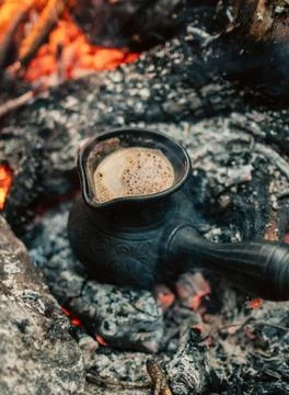 Making coffee process on the campfire Stock Photos