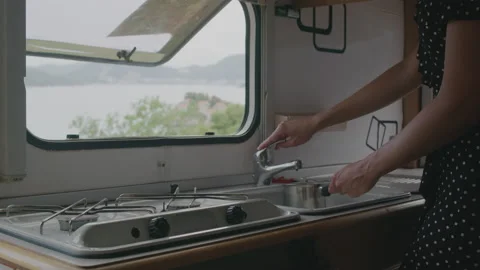 Making coffee process in pot inside motor home RV campervan Stock Footage 138122108
