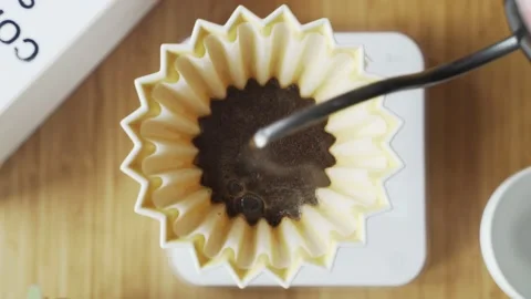 Making coffee. Speciality coffee at home. Barista pours water from the drip Stock Footage 150301162