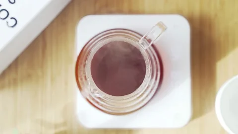 Making coffee. Speciality coffee at home. Fragrant freshly brewed coffee smokes Stock Footage 153603604