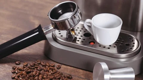 Making coffee tools - cup, filter holder, coffee beans, tamper, milk pitcher. Stock Footage 112680191