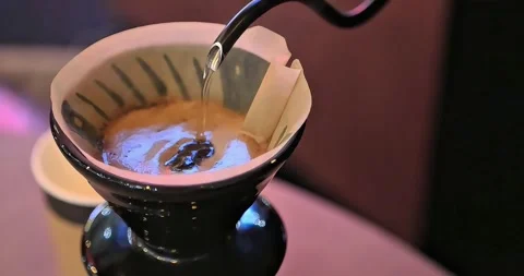 Making coffee with traditional tools by heating the coffee Stock Footage 301747715