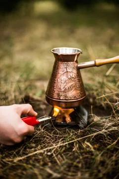 Making coffee while camping on the stove Stock Photos