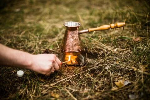 Making coffee while camping on the stove Stock Photos