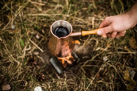 Making coffee while camping on the stove Stock Photos