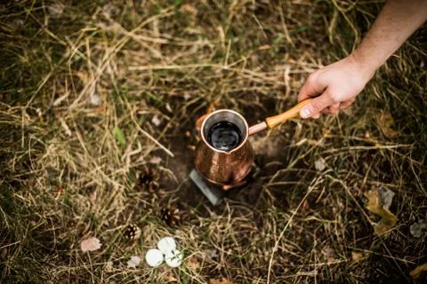 Making coffee while camping on the stove Stock Photos