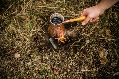 Making coffee while camping on the stove Stock Photos
