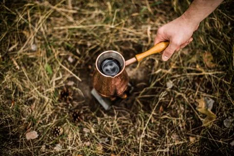 Making coffee while camping on the stove Stock Photos