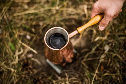 Making coffee while camping on the stove Stock Photos