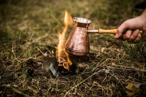 Making coffee while camping on the stove Stock Photos