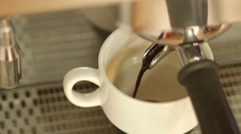 Making coffee in the white cup. Super focus, Close Up 4k Stock Footage 58491902