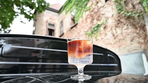 Making cold coffee on the rooftop of the car 库存影片 169359075