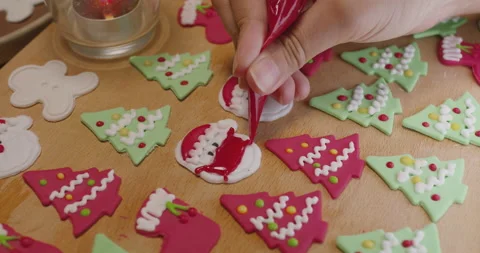 Making colorful gingerman santa cookie wear face mask for Xmas gift. Stock-Footage 163072354