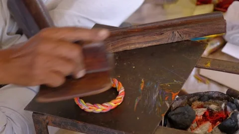 The Making of A Colorful Handmade Lac Bangles. Stock Footage 294330989