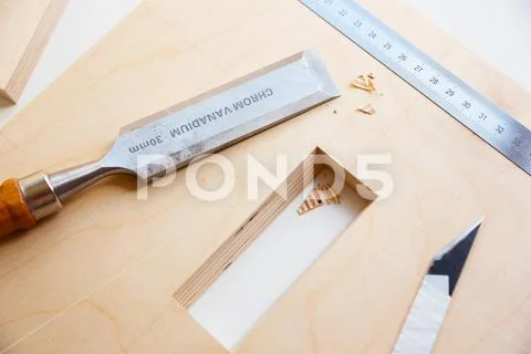 Making a component of wood furniture. Close-up photo Stock Photos