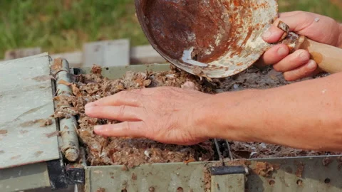 Making Compressed Paper Bricks Stock Footage 207452855