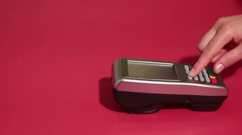 Making contactless payment with smartwatch and pos terminal on red background. Stock Footage 65396261