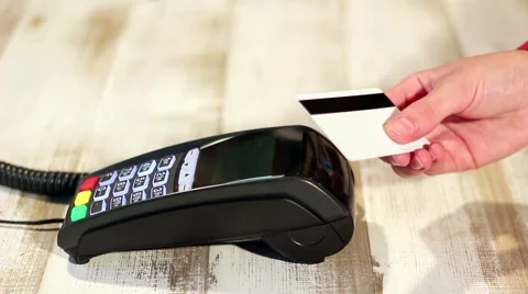 Making contactless payment using pos terminal with NFC chip Stock Footage 65392804