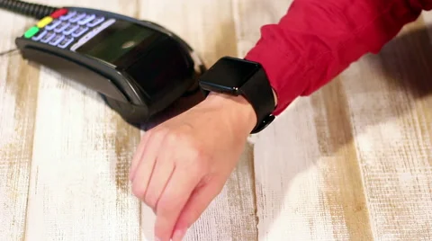 Making contactless payment using smartwatch Stock Footage 65393416