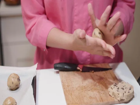 Making cookies with cookie dough Stock Footage 80739460