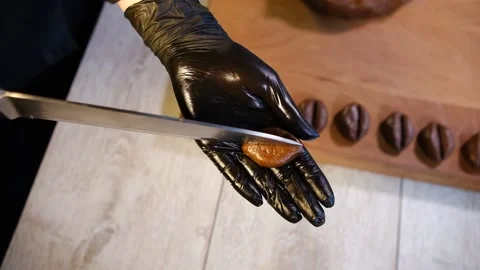 Making cookies in the form of coffee beans top view Stock Footage 194736939