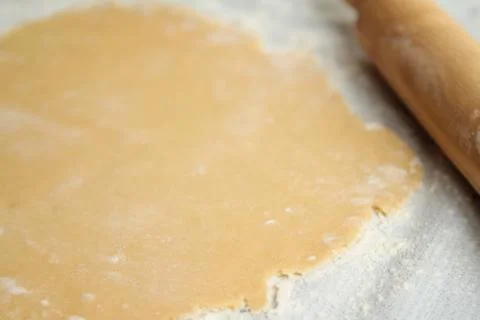 Making cookies on kitchen table Stock Photos