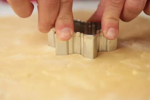 Making cookies on kitchen table Stock Photos