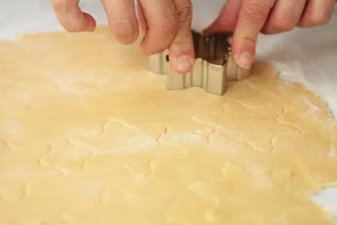 Making cookies on kitchen table Stock Photos