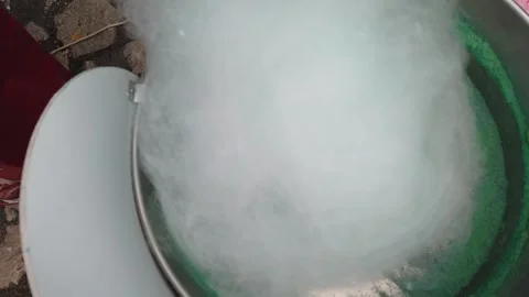 Making cotton candy or candy floss in street food market Stock Footage 266831203