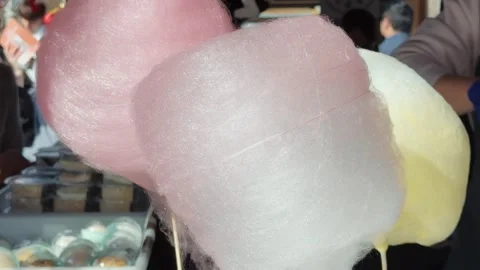 Making cotton candy or candy floss in street food market. Stock Footage 275174323