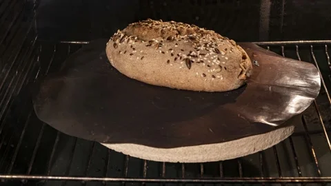 Making craft yeast-free bread in a home oven, time lapse Stock Footage 145655088