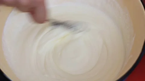 Making cream for cake Stock Footage 42693619